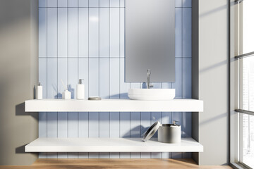 Sink in grey and blue panoramic bathroom