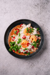 Shrimp with basmati rice and spicy bisque with coconut milk