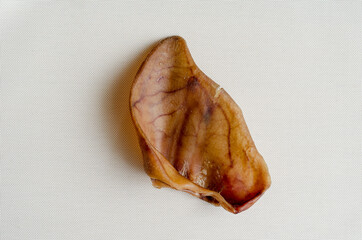 Dried pork ear for pets.