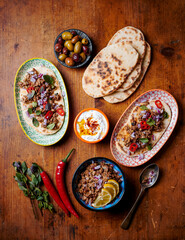 Lamb with anchovies and flat bread