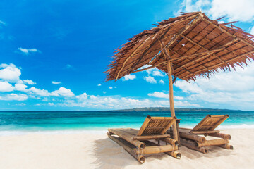 Beach chairs and umbrella