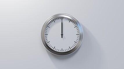 Glossy chrome clock on a white wall at twelve o'clock. Time is 00:00 or 12:00
