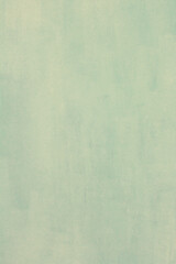 Background of beautiful scratched metal texture painted in different shades of green.