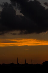 Sunset sky with dark shadow of city,close up taken.