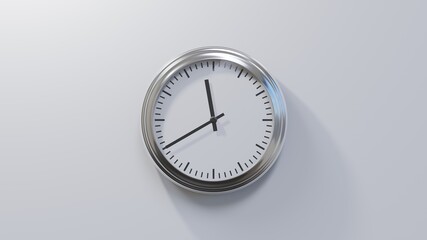 Glossy chrome clock on a white wall at twenty to zero. Time is 11:40 or 23:40