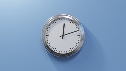 Glossy chrome clock on a blue wall at twelve past twelve. Time is 00:12 or 12:12