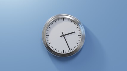 Glossy chrome clock on a blue wall at twenty-six past two. Time is 02:26 or 14:26