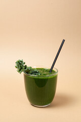 Green vegetable juice or kale smoothie. Homemade healthy drink. Copy space