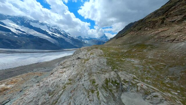 Drone Flying Along The Rugged Surface Of Gornergletscher Glacier Or Gorner Glacier In Zermatt, Switzerland - FPV drone shot