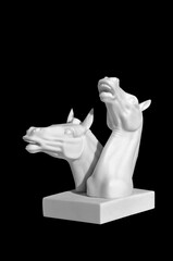 sculpture of a horse on a black background