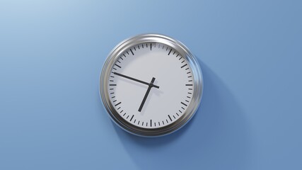 Glossy chrome clock on a blue wall at forty-eight past six. Time is 06:48 or 18:48