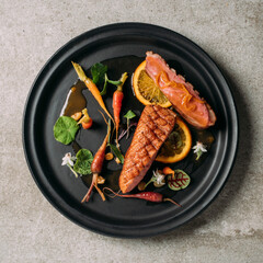 Duck breast with baby carrots and orange