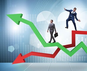 Fototapeta premium Opposite growth and decliine charts with businessman