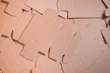 Lot of unfolded brown cardboard boxes