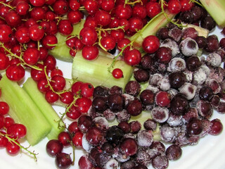 frozen black and red currant berries. close up photo of berries. berries for compote or jam