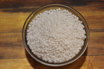 Sago or Sabudana served in a bowl over white background