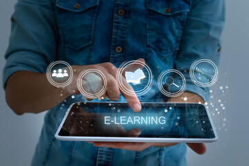 hand pressing learning word button. business concept. e learning