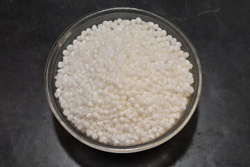 Sago or Sabudana served in a bowl over white background