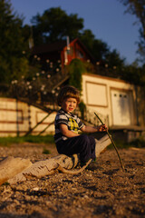 littleboyplaying with toy airplane