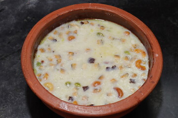 Sago Kheer or Sabudana Khir is a sweet food with clay pot from India
