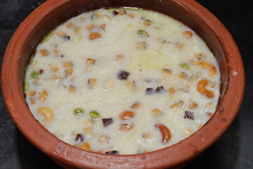 Sago Kheer or Sabudana Khir is a sweet food with clay pot from India