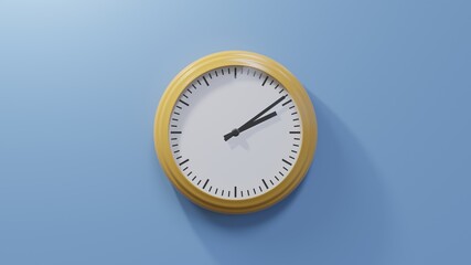 Glossy orange clock on a blue wall at nine past two. Time is 02:09 or 14:09