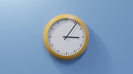 Glossy orange clock on a blue wall at six past three. Time is 03:06 or 15:06