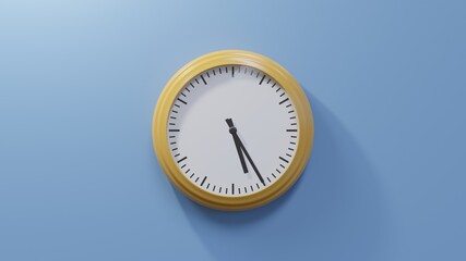Glossy orange clock on a blue wall at twenty-five past five. Time is 05:25 or 17:25