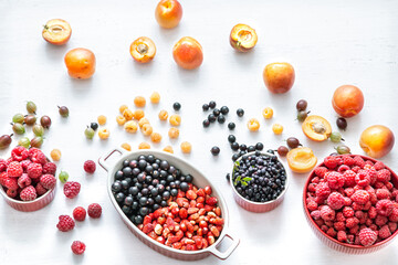 Composition with a variety of fresh berries and fruits