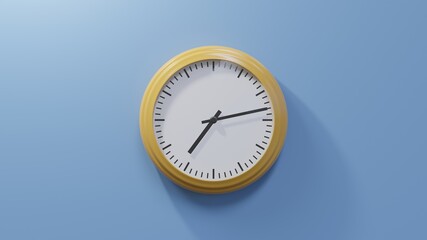 Glossy orange clock on a blue wall at thirteen past seven. Time is 07:13 or 19:13