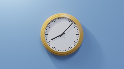 Glossy orange clock on a blue wall at seven past eight. Time is 08:07 or 20:07