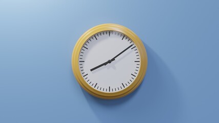 Glossy orange clock on a blue wall at nine past eight. Time is 08:09 or 20:09