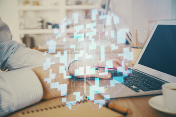 Businessman working on Laptop with technology theme drawing. Concept of big data. Double exposure.