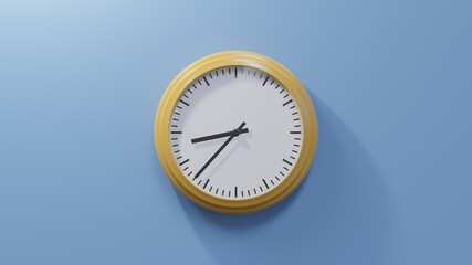 Glossy orange clock on a blue wall at thirty-seven past eight. Time is 08:37 or 20:37