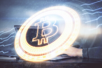 Fototapeta premium Blockchain theme hud with businessman working on computer on background. Concept of crypto chain. Double exposure.
