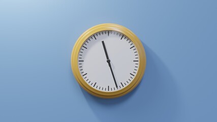 Glossy orange clock on a blue wall at twenty-seven past eleven. Time is 11:27 or 23:27