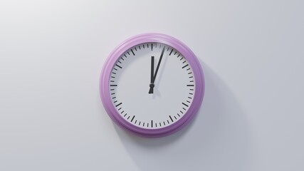 Glossy pink clock on a white wall at three past twelve. Time is 00:03 or 12:03