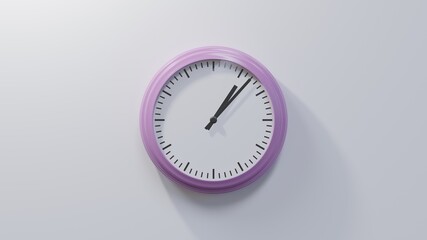 Glossy pink clock on a white wall at seven past one. Time is 01:07 or 13:07