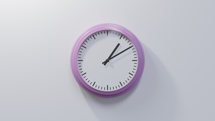 Glossy pink clock on a white wall at ten past one. Time is 01:10 or 13:10