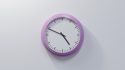 Glossy pink clock on a white wall at forty-nine past four. Time is 04:49 or 16:49