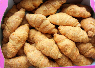 Croissants with condensed milk. Sweet dessert. Baking for tea.