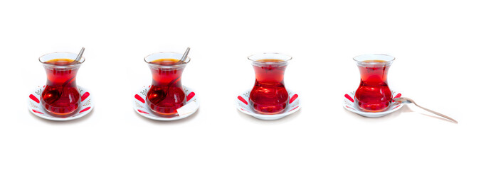 Four glass of turkish tea isolated on white background - The cup of tea in the back is blurred