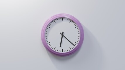 Glossy pink clock on a white wall at twenty-two past six. Time is 06:22 or 18:22