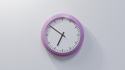 Glossy pink clock on a white wall at fifty-one past six. Time is 06:51 or 18:51