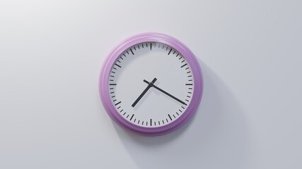 Glossy pink clock on a white wall at twenty past seven. Time is 07:20 or 19:20