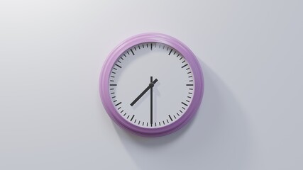 Glossy pink clock on a white wall at half past seven. Time is 07:30 or 19:30