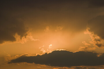 The sun at sunset and, slightly covering it, clouds (option 6)