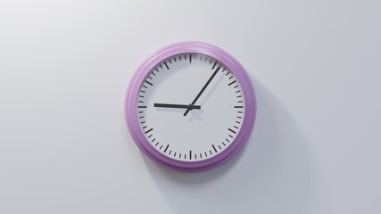 Glossy pink clock on a white wall at six past nine. Time is 09:06 or 21:06