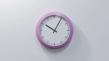 Glossy pink clock on a white wall at five past ten. Time is 10:05 or 22:05