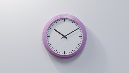 Glossy pink clock on a white wall at ten past ten. Time is 10:10 or 22:10